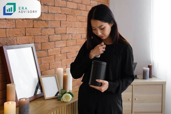 Why Should I Have My Estate Planning Done Today - Grieving Young Asian Woman with Urn
